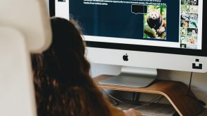 Girl doing her homework on the family computer