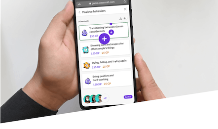 Two hands holding a mobile phone with the Classcraft platform on the screen
