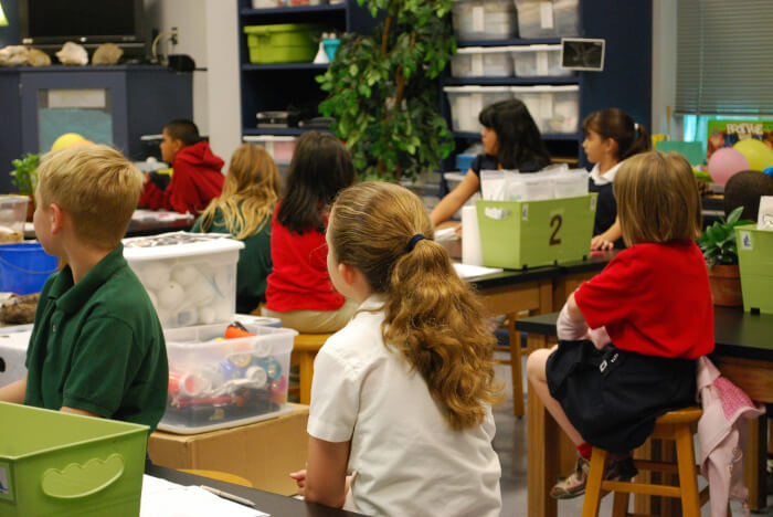 Students in a science classroom lab