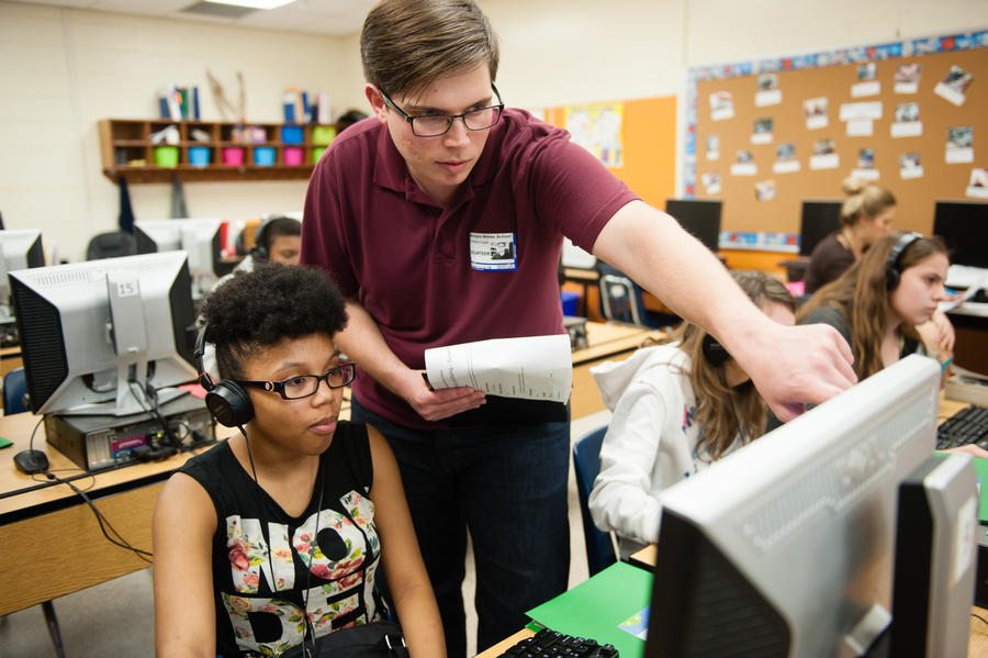 Teacher and students in classroom
