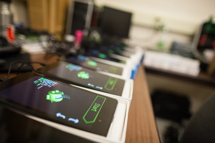 multiple tablets on a table with the same software loaded